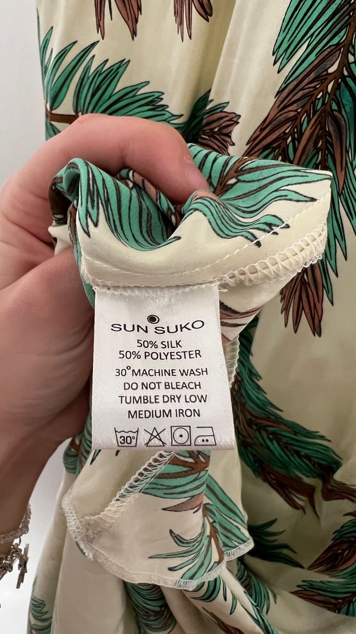 Bandeau-Kleid mit Pfauenfedern