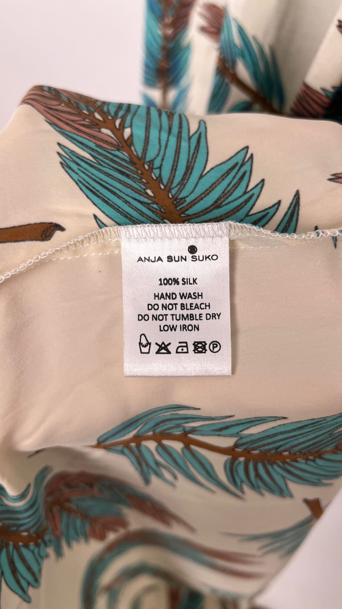 Bandeau-Kleid mit Pfauenfedern